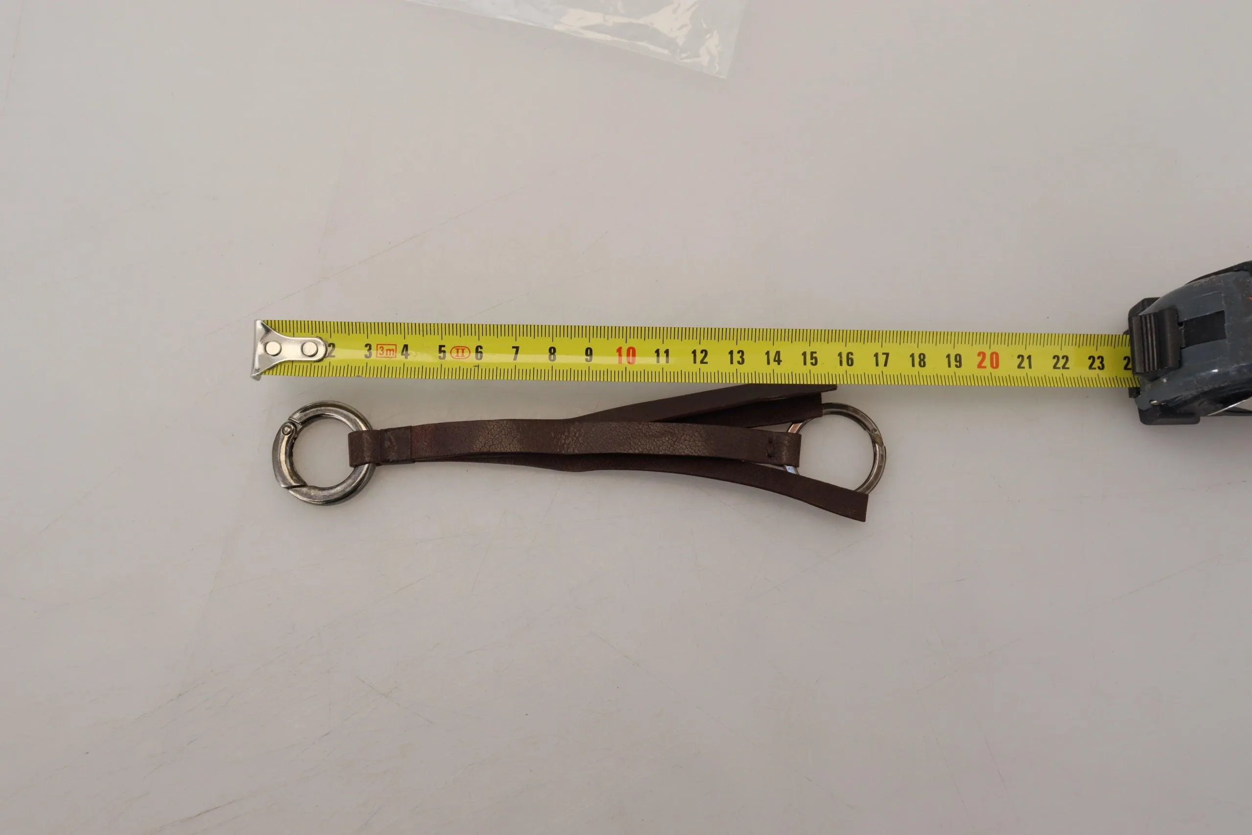 Costume National Elegant Brass & Leather Keychain Charm